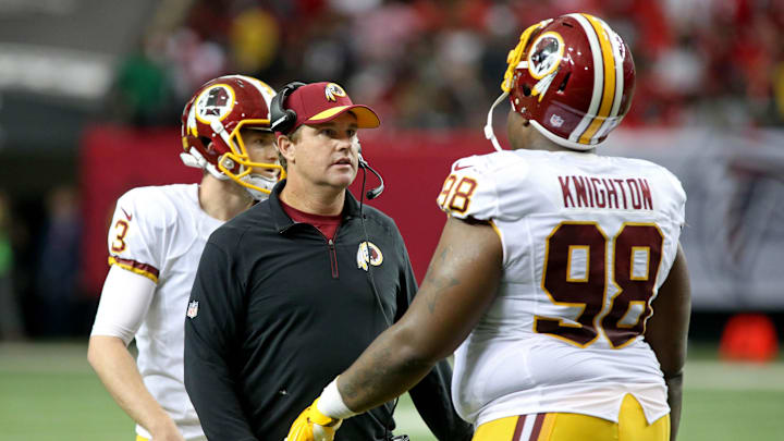 Oct 11, 2015; Atlanta, GA, USA; Washington Redskins head coach Jay Gruden talks with defensive tackle Terrance Knighton (98) in the fourth quarter of their game against the Atlanta Falcons at the Georgia Dome. The Falcons won 25-19 in overtime. Mandatory Credit: Jason Getz-Imagn Images