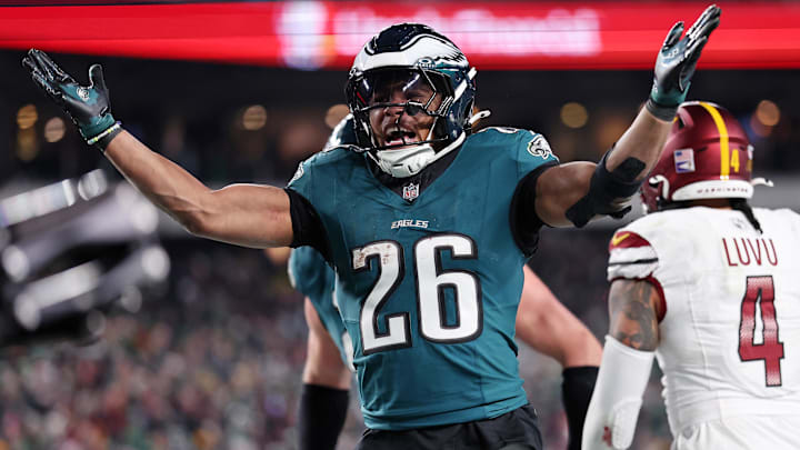 Jan 26, 2025; Philadelphia, PA, USA; Philadelphia Eagles running back Saquon Barkley (26) celebrates after a touchdown against the Washington Commanders during the second half in the NFC Championship game at Lincoln Financial Field. Mandatory Credit: Bill Streicher-Imagn Images