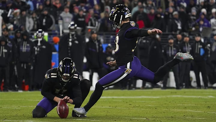 Dec 21, 2025; Baltimore, Maryland, USA;  Baltimore Ravens place kicker Tyler Loop (33) makes a field goal from the hold of punter Jordan Stout (11) during the first half of the game against the New England Patriots at M&T Bank Stadium. Mandatory Credit: James Lang-Imagn Images