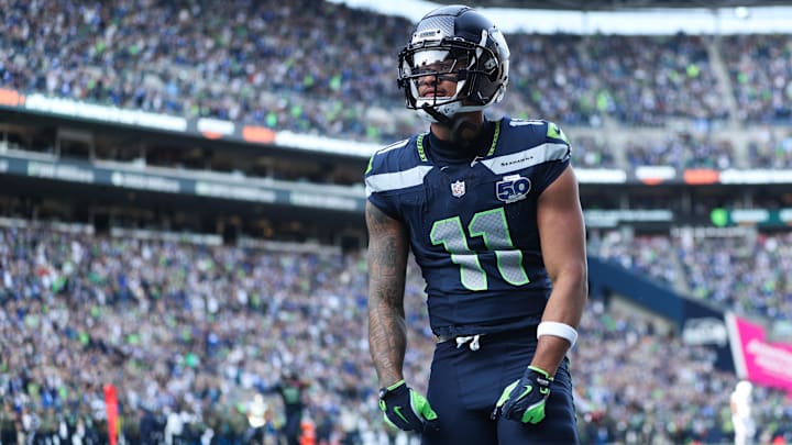 Seattle Seahawks wide receiver Jaxon Smith-Njigba (11) celebrates after scoring a touchdown during the first quarter against the Arizona Cardinals at Lumen Field. 