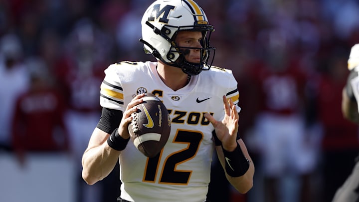 Oct 26, 2024; Tuscaloosa, Alabama, USA;  Missouri Tigers quarterback Brady Cook (12) throws a pass during the first half against the Alabama Crimson Tide at Bryant-Denny Stadium. Mandatory Credit: Butch Dill-Imagn Images
