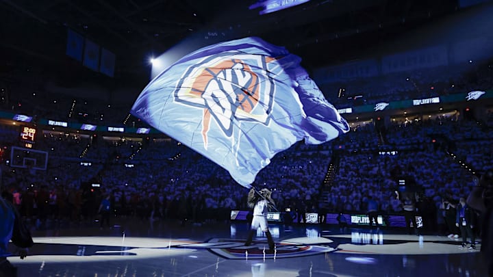 Apr 21, 2024; Oklahoma City, Oklahoma, USA; Oklahoma City Thunder mascot Rumble the Bison waves a giant flag before the start of game one of the first round for the 2024 NBA playoffs at Paycom Center. Mandatory Credit: Alonzo Adams-Imagn Images Apr 21, 2024; Oklahoma City, Oklahoma, USA; Oklahoma City Thunder mascot Rumble the Bison waves a giant flag before the start of game one of the first round for the 2024 NBA playoffs at Paycom Center. Mandatory Credit: Alonzo Adams-Imagn Images