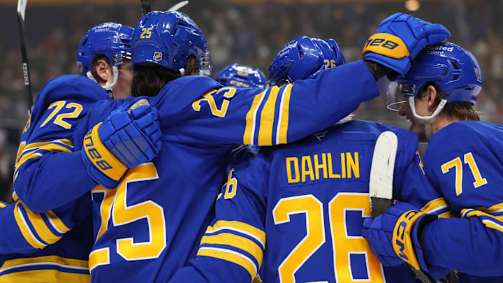 Jan 31, 2026; Buffalo, New York, USA;  Buffalo Sabres defenseman Owen Power (25) celebrates his goal with teammates during the second period against the Montréal Canadiens at KeyBank Center. Mandatory Credit: Timothy T. Ludwig-Imagn Images