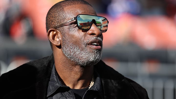 Dec 21, 2025; Cleveland, Ohio, USA;  Legendary  football and baseball player and father of Cleveland Browns quarterback Shedeur Sanders, Deion Sanders on the sidelines prior to a game against the Buffalo Bills at Huntington Bank Field.