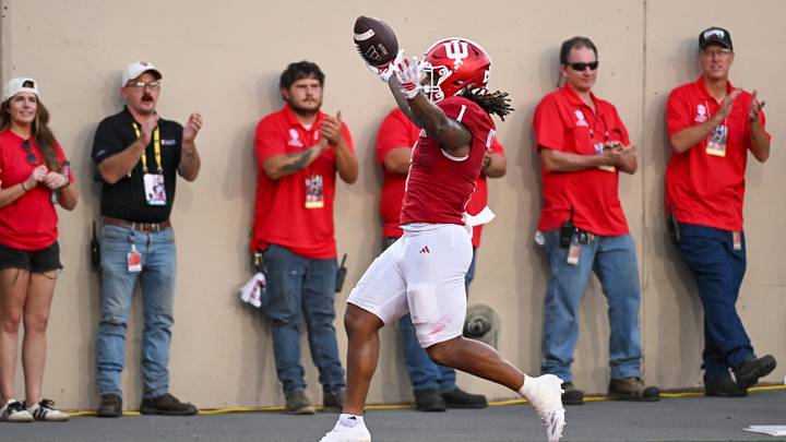 Sep 19, 2026; Bloomington, Indiana, USA; Indiana Hoosiers running back Turbo Richard (1) celebrates after scoring a touchdown against the Western Kentucky Hilltoppers during the second half at Merchants Bank Field at Memorial Stadium. Mandatory Credit: Robert Goddin-Imagn Images
