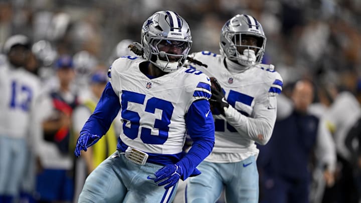 Aug 16, 2025; Arlington, Texas, USA; Dallas Cowboys linebacker James Houston (53) and cornerback Andrew Booth (25) return an interception for a touchdown during the game between the Dallas Cowboys and the Baltimore Ravens at AT&T Stadium. Mandatory Credit: Jerome Miron-Imagn Images