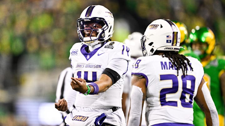 Eugene, OR, USA; James Madison Dukes quarterback Alonza Barnett III (14) celebrates after a play during the first quarter against the Oregon Ducks at Autzen Stadium.