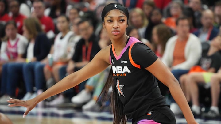 Team WNBA forward Angel Reese gets in position against USA Women's National Team.