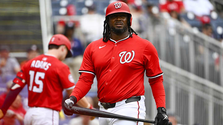 Jun 8, 2025; Washington, District of Columbia, USA; Washington Nationals designated hitter Josh Bell (19) reacts after striking out against the Texas Rangers during the second inning at Nationals Park. 