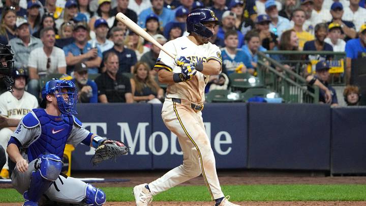 Oct 12, 2026; Milwaukee, Wisconsin, USA; Milwaukee Brewers infielder David Hamilton (6) hits an RBI single to score infielder Brice Turang (not pictured) against Los Angeles Dodgers catcher Will Smith (16) during the eighth inning in game two of the NLCS for the 2026 MLB Playoffs at American Family Field. Mandatory Credit: Michael McLoone-Imagn Images Oct 12, 2026; Milwaukee, Wisconsin, USA; Milwaukee Brewers infielder David Hamilton (6) hits an RBI single to score infielder Brice Turang (not pictured) against Los Angeles Dodgers catcher Will Smith (16) during the eighth inning in game two of the NLCS for the 2026 MLB Playoffs at American Family Field. Mandatory Credit: Michael McLoone-Imagn Images