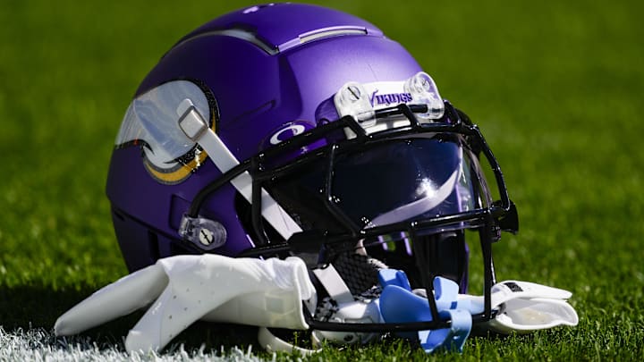 Sep 29, 2024; Green Bay, Wisconsin, USA; General view of a Minnesota Vikings helmet during warmups prior to the game against the Green Bay Packers at Lambeau Field. Mandatory Credit: Jeff Hanisch-Imagn Images Sep 29, 2024; Green Bay, Wisconsin, USA; General view of a Minnesota Vikings helmet during warmups prior to the game against the Green Bay Packers at Lambeau Field. Mandatory Credit: Jeff Hanisch-Imagn Images