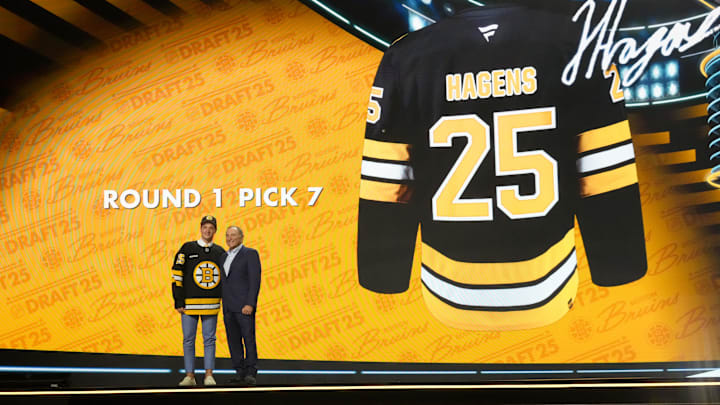 Jun 27, 2025; Los Angeles, California, USA; James Hagens is selected as the seventh overall pick to the Boston Bruins in the first round of the 2025 NHL Draft at Peacock Theater. Mandatory Credit: Kirby Lee-Imagn Images Jun 27, 2025; Los Angeles, California, USA; James Hagens is selected as the seventh overall pick to the Boston Bruins in the first round of the 2025 NHL Draft at Peacock Theater. Mandatory Credit: Kirby Lee-Imagn Images
