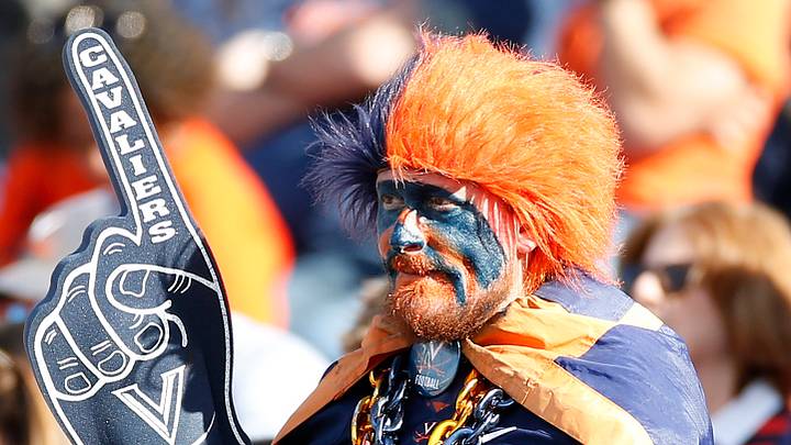 Nov 4, 2023; Charlottesville, Virginia, USA; A Virginia Cavaliers fans looks on from the stands during the Cavaliers' game against the Georgia Tech Yellow Jackets in the first half at Scott Stadium. 