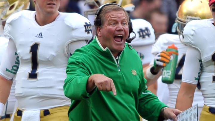 Sep 1, 2012; Dublin, IRELAND; Notre Dame Fighting Irish head coach Brian Kelly yells from the sideline in the third quarter against the Navy Midshipmen at Aviva Stadium. Notre Dame won 50-10. 