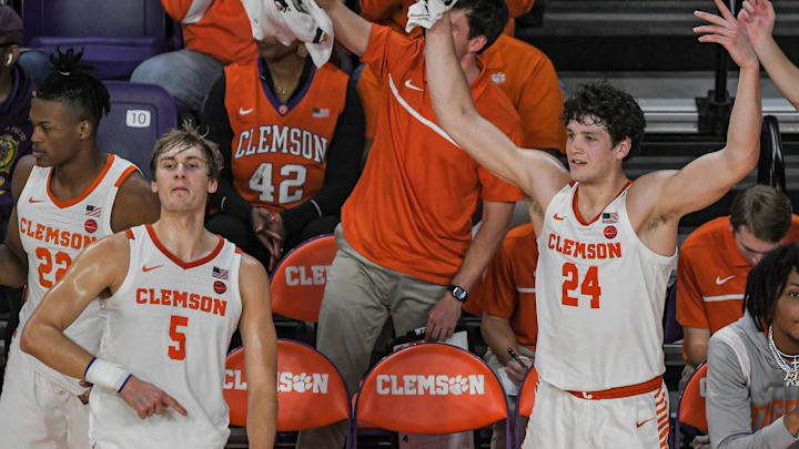Clemson forward Hunter Tyson (5) and Clemson sophomore forward PJ Hall (24) celebrate in the closing second of the second half against Wake Forest at Littlejohn Coliseum Friday, December 2, 2022.

Clemson Basketball Vs Wake Forest University Acc