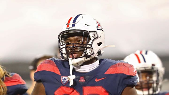 Dec 11, 2020; Tucson, Arizona, USA; Arizona Wildcats defensive tackle Kyon Barrs (92) against the Arizona State Sun Devils during the Territorial Cup at Arizona Stadium. Mandatory Credit: Mark J. Rebilas-Imagn Images Dec 11, 2020; Tucson, Arizona, USA; Arizona Wildcats defensive tackle Kyon Barrs (92) against the Arizona State Sun Devils during the Territorial Cup at Arizona Stadium. Mandatory Credit: Mark J. Rebilas-Imagn Images