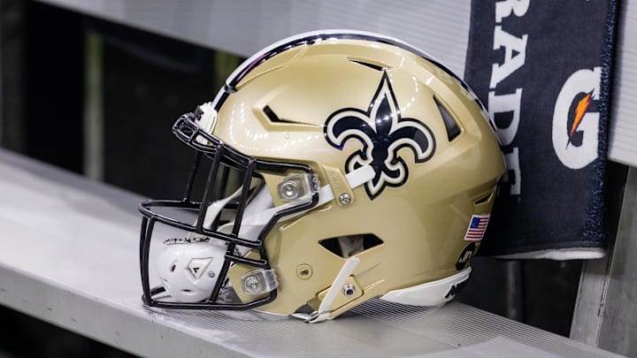 Nov 5, 2023; New Orleans, Louisiana, USA;  Detailed view of the New Orleans Saints helmet on the team bench against the Chicago Bears during the first half at the Caesars Superdome. Mandatory Credit: Stephen Lew-Imagn Images