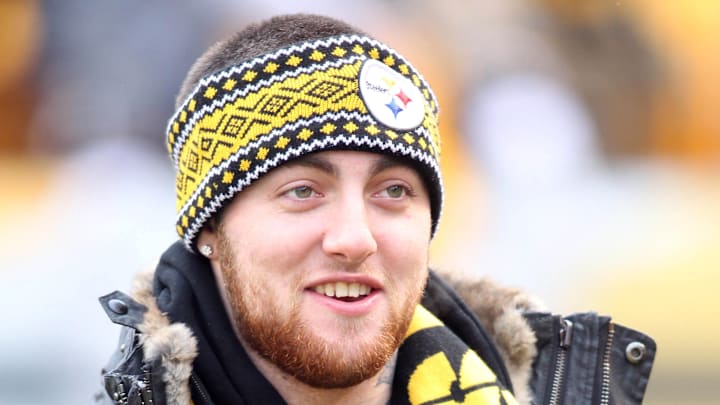December 30, 2012; Pittsburgh, PA, USA; Recording artist Mac Miller on the field prior to the Cleveland Browns and Pittsburgh Steelers NFL contest at Heinz Field. Mandatory Credit: Charles LeClaire-Imagn Images