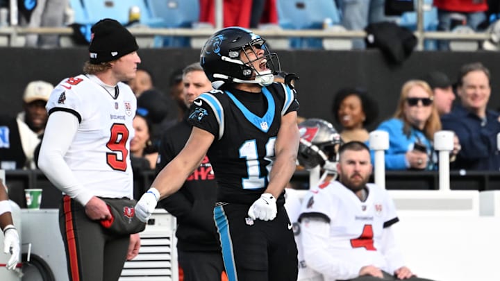 Dec 21, 2025; Charlotte, North Carolina, USA;  Carolina Panthers wide receiver Jalen Coker (18) reacts in the fourth quarter at Bank of America Stadium. Mandatory Credit: Bob Donnan-Imagn Images