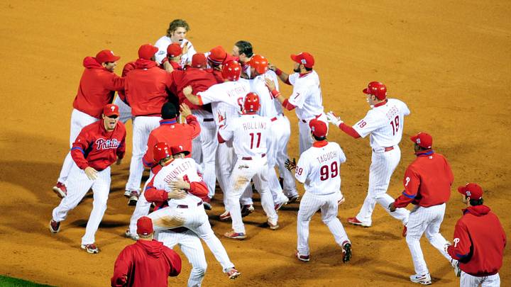 Oct 25 2008; Philadelphia, PA, USA; The Philadelphia Phillies celebrate the game-winning RBI single by Philadelphia Phillies catcher Carlos Ruiz (51) which scored shortstop Eric Bruntlett (4) in the ninth inning to defeat the Tampa Bay Rays 5-4 during game three of the World Series at Citizens Bank Park. Mandatory Credit: James Lang-USA TODAY Sports Oct 25 2008; Philadelphia, PA, USA; The Philadelphia Phillies celebrate the game-winning RBI single by Philadelphia Phillies catcher Carlos Ruiz (51) which scored shortstop Eric Bruntlett (4) in the ninth inning to defeat the Tampa Bay Rays 5-4 during game three of the World Series at Citizens Bank Park. Mandatory Credit: James Lang-USA TODAY Sports