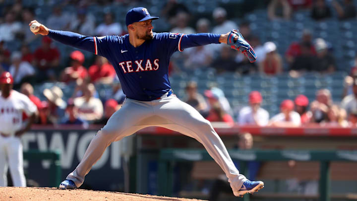 Sep 29, 2024; Anaheim, California, USA; Texas Rangers starting pitcher Nathan Eovaldi (17) pitches during the third inning against the Los Angeles Angels at Angel Stadium. Sep 29, 2024; Anaheim, California, USA; Texas Rangers starting pitcher Nathan Eovaldi (17) pitches during the third inning against the Los Angeles Angels at Angel Stadium.