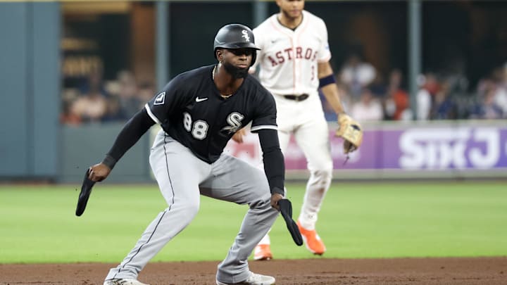 Jun 10, 2025; Houston, Texas, USA;  Chicago White Sox center fielder Luis Robert Jr. (88) reacts to his stand up double RBI against the Houston Astros in the first inning at Daikin Park. Mandatory Credit: Thomas Shea-Imagn Images