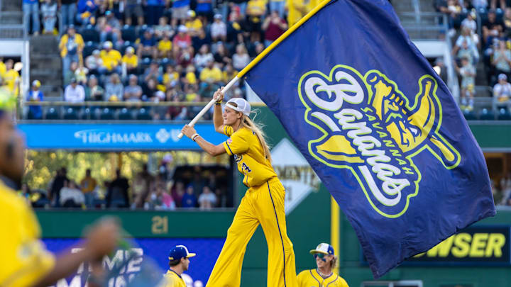 Savannah Banana pitcher Dakota Albritton waves a Bananas flag during the Savannah Bananas game against the Texas Tailgaters Saturday, Aug. 30, 2025 at PNC Park in Pittsburgh, Pa.