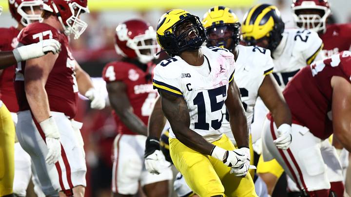 Sep 6, 2025; Norman, Oklahoma, USA; Michigan Wolverines linebacker Ernest Hausmann (15) reacts after a tackle against the Oklahoma Sooners during the first half at Gaylord Family-Oklahoma Memorial Stadium. Mandatory Credit: Kevin Jairaj-Imagn Images