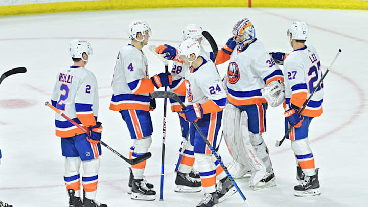 Jan 4, 2024; Tempe, Arizona, USA; The New York Islanders celebrate after beating the Arizona Coyotes
