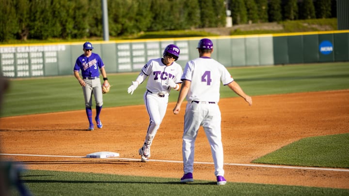 Jack Bell jogs around 3rd base after a 2-run moonshot over the right field fence. 