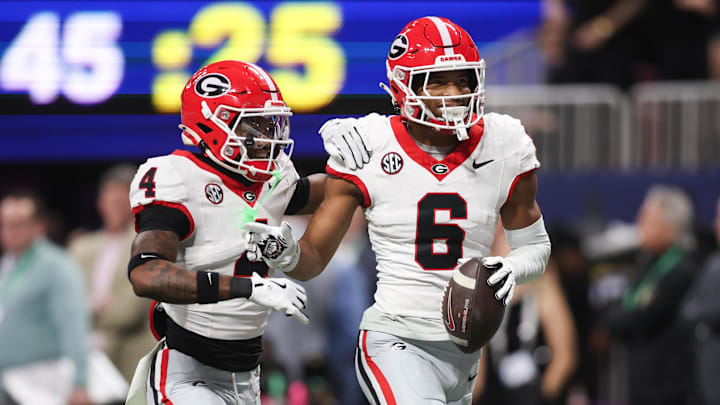 Dec 6, 2025; Atlanta, GA, USA; Georgia Bulldogs defensive back Daylen Everette (6) celebrates an interception with Georgia Bulldogs defensive back Kj Bolden (4) during the second quarter during the 2025 SEC Championship game at Mercedes-Benz Stadium. Mandatory Credit: Brett Davis-Imagn Images Dec 6, 2025; Atlanta, GA, USA; Georgia Bulldogs defensive back Daylen Everette (6) celebrates an interception with Georgia Bulldogs defensive back Kj Bolden (4) during the second quarter during the 2025 SEC Championship game at Mercedes-Benz Stadium. Mandatory Credit: Brett Davis-Imagn Images