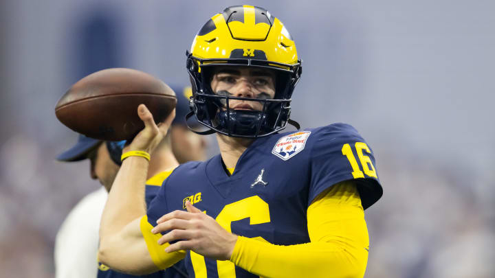 Dec 31, 2022; Glendale, Arizona, USA; Michigan Wolverines quarterback Davis Warren (16) against the TCU Horned Frogs during the 2022 Fiesta Bowl at State Farm Stadium. Mandatory Credit: Mark J. Rebilas-USA TODAY Sports