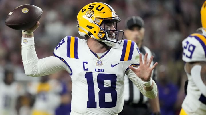 Nov 8, 2025; Tuscaloosa, Alabama, USA;  LSU quarterback Garrett Nussmeier (18) throws a pass during the second half of the game with Alabama at Saban Field at Bryant-Denny Stadium. Alabama defeated LSU 20-9. Mandatory Credit: Gary Cosby Jr.-Imagn Images