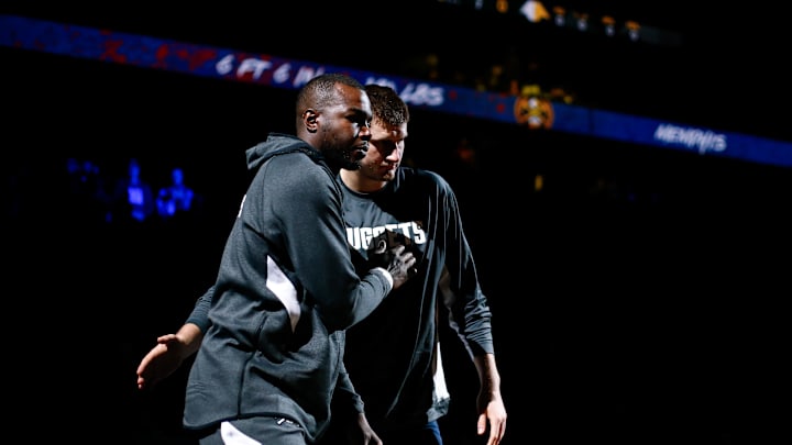Denver Nuggets forward Paul Millsap (4) and center Nikola Jokic (15) before the game against the Dallas Mavericks at the Pepsi Center. 