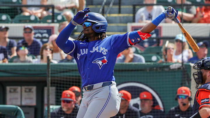 Mar 1, 2026; Lakeland, Florida, USA; Toronto Blue Jays third baseman Charles McAdoo (26) hits during the third inning against the Detroit Tigers at Publix Field at Joker Marchant Stadium. Mandatory Credit: Mike Watters-Imagn Images