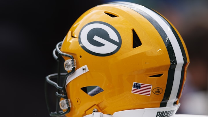 Sep 24, 2023; Green Bay, Wisconsin, USA;  A Green Bay Packers helmet sits on the sidelines during the game against the New Orleans Saints at Lambeau Field. Mandatory Credit: Jeff Hanisch-Imagn Images