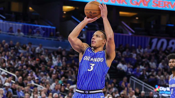 Dec 27, 2025; Orlando, Florida, USA; Orlando Magic guard Desmond Bane (3) shoots a technical foul shot during the second quarter against the Denver Nuggets at Kia Center. Mandatory Credit: Mike Watters-Imagn Images