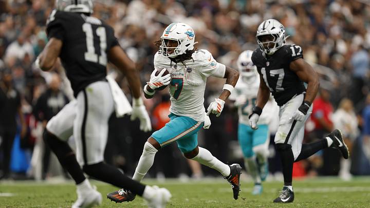 Miami Dolphins wide receiver Caleb Douglas (7) runs with the ball in the second quarter against the Las Vegas Raiders at Allegiant Stadium. Miami Dolphins wide receiver Caleb Douglas (7) runs with the ball in the second quarter against the Las Vegas Raiders at Allegiant Stadium.