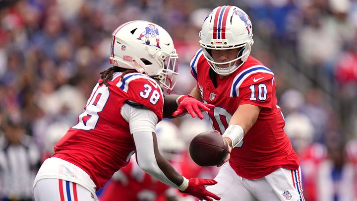 Oct 11, 2026; Foxborough, Massachusetts, USA; New England Patriots quarterback Drake Maye (10) hands the ball to running back Rhamondre Stevenson (38) against the Las Vegas Raiders during the second quarter at Gillette Stadium. Mandatory Credit: David Butler II-Imagn Images Oct 11, 2026; Foxborough, Massachusetts, USA; New England Patriots quarterback Drake Maye (10) hands the ball to running back Rhamondre Stevenson (38) against the Las Vegas Raiders during the second quarter at Gillette Stadium. Mandatory Credit: David Butler II-Imagn Images