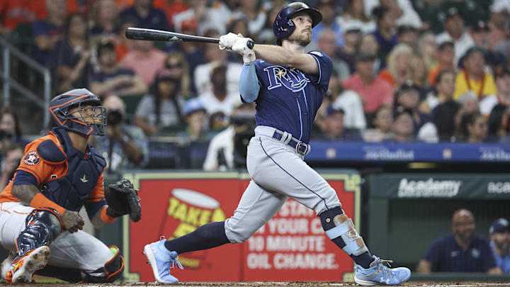 Jul 28, 2023; Houston, Texas, USA; Tampa Bay Rays second baseman Brandon Lowe (8) hits a three-run home run during the first inning against the Houston Astros at Minute Maid Park. Jul 28, 2023; Houston, Texas, USA; Tampa Bay Rays second baseman Brandon Lowe (8) hits a three-run home run during the first inning against the Houston Astros at Minute Maid Park.