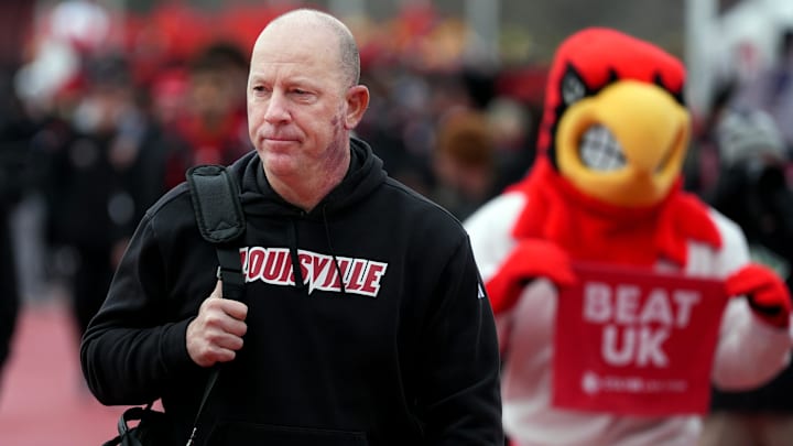 Louisville’s Jeff Brohm walks during the Card March before the game before Kentucky in the Governor’s Cup.
November 29, 2025