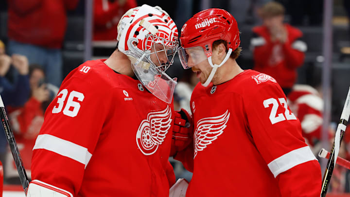 Oct 25, 2025; Detroit, Michigan, USA;  Detroit Red Wings goaltender John Gibson (36) and center Mason Appleton (22) celebrate after defeating the St. Louis Blues at Little Caesars Arena. Mandatory Credit: Rick Osentoski-Imagn Images