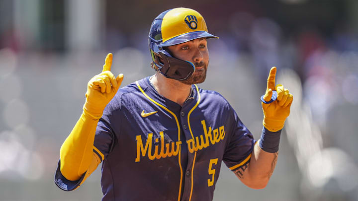 Aug 8, 2024; Cumberland, Georgia, USA; Milwaukee Brewers center fielder Garrett Mitchell (5) reacts after hitting a home run against the Atlanta Braves during the second inning at Truist Park. Mandatory Credit: Dale Zanine-USA TODAY Sports