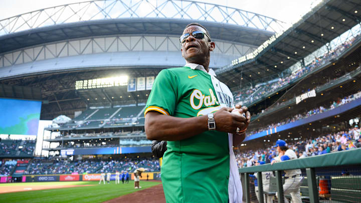 Sep 29, 2024; Seattle, Washington, USA; MLB Hall of Famer Rickey Henderson after throwing out the ceremonial first pitch before the game between the Seattle Mariners and the Oakland Athletics at T-Mobile Park. Mandatory Credit: Steven Bisig-Imagn Images