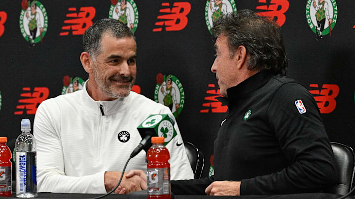 Sep 25, 2025; Boston, MA, USA; Boston Celtics lead owner and governor Bill Chisholm (l) shakes hands with co-owner, alternate governor and CEO Wyc Grousbeck (r) during a press conference at the Auerbach Center. Mandatory Credit: Eric Canha-Imagn Images Sep 25, 2025; Boston, MA, USA; Boston Celtics lead owner and governor Bill Chisholm (l) shakes hands with co-owner, alternate governor and CEO Wyc Grousbeck (r) during a press conference at the Auerbach Center. Mandatory Credit: Eric Canha-Imagn Images