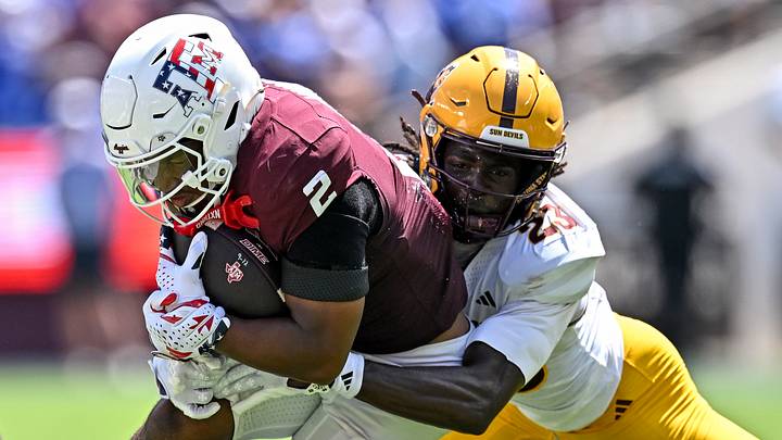 Sep 12, 2026; College Station, Texas, USA; Arizona State Sun Devils defensive back Jessiah McGrew (23) tackles Texas A&M Aggies running back Jamarion Morrow (2) at Kyle Field. Mandatory Credit: Maria Lysaker-Imagn Images Sep 12, 2026; College Station, Texas, USA; Arizona State Sun Devils defensive back Jessiah McGrew (23) tackles Texas A&M Aggies running back Jamarion Morrow (2) at Kyle Field. Mandatory Credit: Maria Lysaker-Imagn Images
