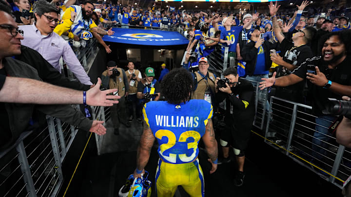 Los Angeles Rams running back Kyren Williams (23) walks off the field after their 27-9 playoff win over the Minnesota Vikings at State Farm Stadium on Jan. 13, 2025, in Glendale.