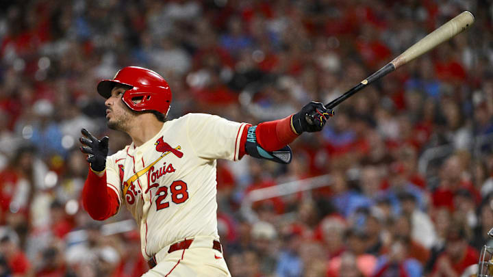 Sep 20, 2025; St. Louis, Missouri, USA; St. Louis Cardinals third baseman Nolan Arenado (28) hits a one run single against the Milwaukee Brewers during the fourth inning at Busch Stadium. Mandatory Credit: Jeff Curry-Imagn Images