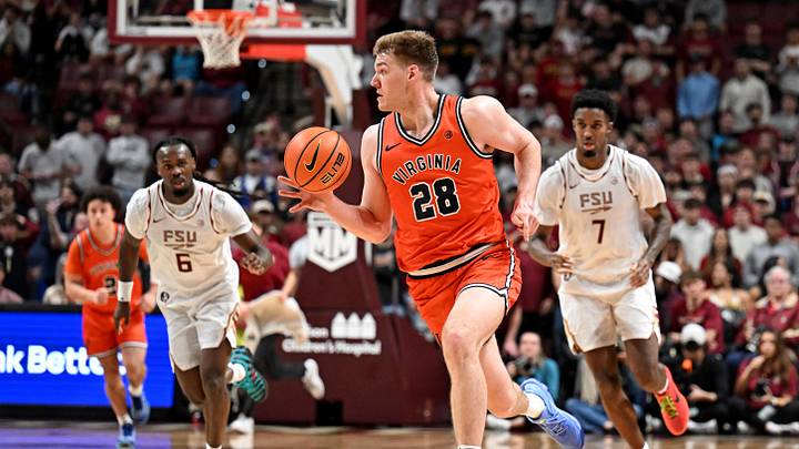 Feb 10, 2026; Tallahassee, Florida, USA; Virginia Cavaliers forward Thijs De Ridder (28) drives the ball down the court during the second half against the Florida State Seminoles at Donald L. Tucker Center. Mandatory Credit: Melina Myers-Imagn Images