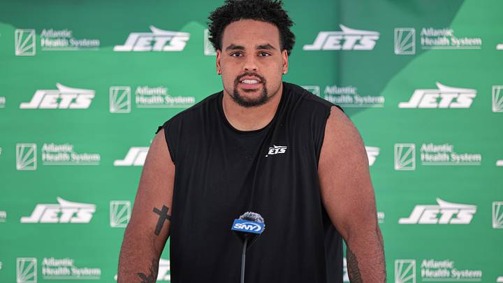 Jul 27, 2024; Florham Park, NJ, USA; New York Jets offensive tackle Olu Fashanu (74) talks with media during training camp at Atlantic Health Jets Training Center. Mandatory Credit: Vincent Carchietta-Imagn Images